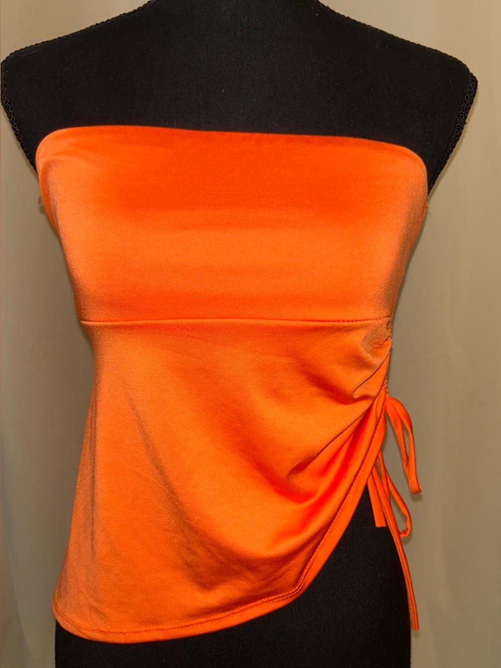Live in the Moment orange top. Size juniors small. Has a silky like feel
